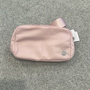 Brand new light pink Lululemon Belt bag